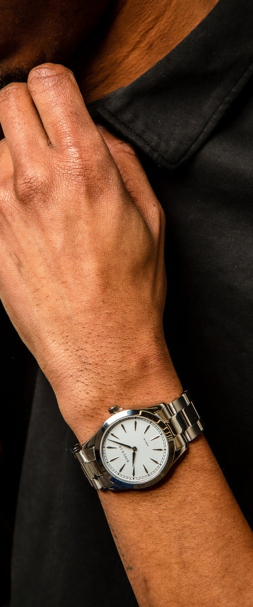 Man wearning white silver watch from Duku & Co.